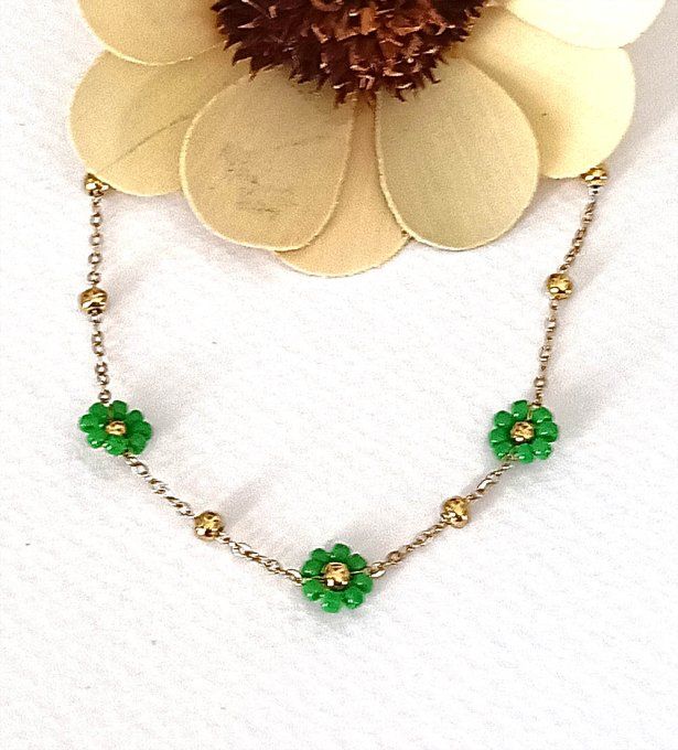 Bracelet-acier-chaine-maillon-fleur-vert-dore